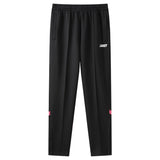 Black pants with a brand logo on a white background