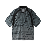 Geometric patterned shirt with brand logo on a light gray background